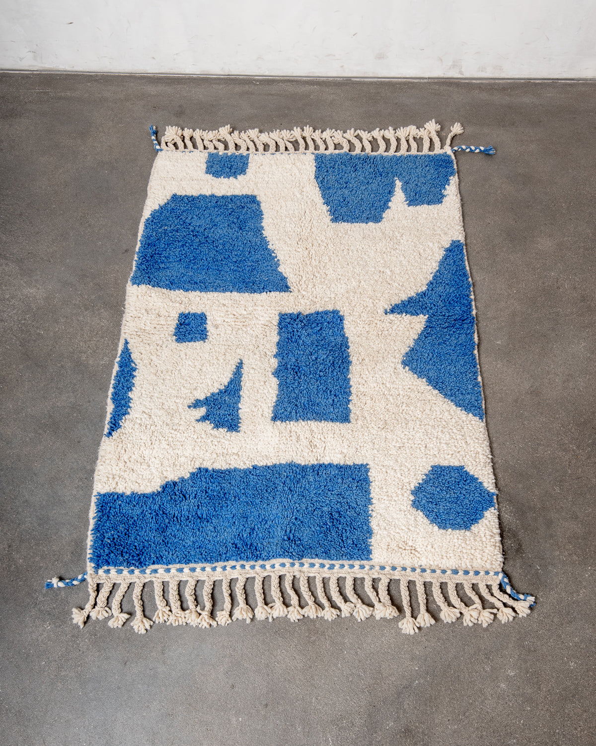 Modern, designer, handcrafted Berber rug from Morocco. Beniourain carpet with beautiful colours and patterns and fluffy wool texture.